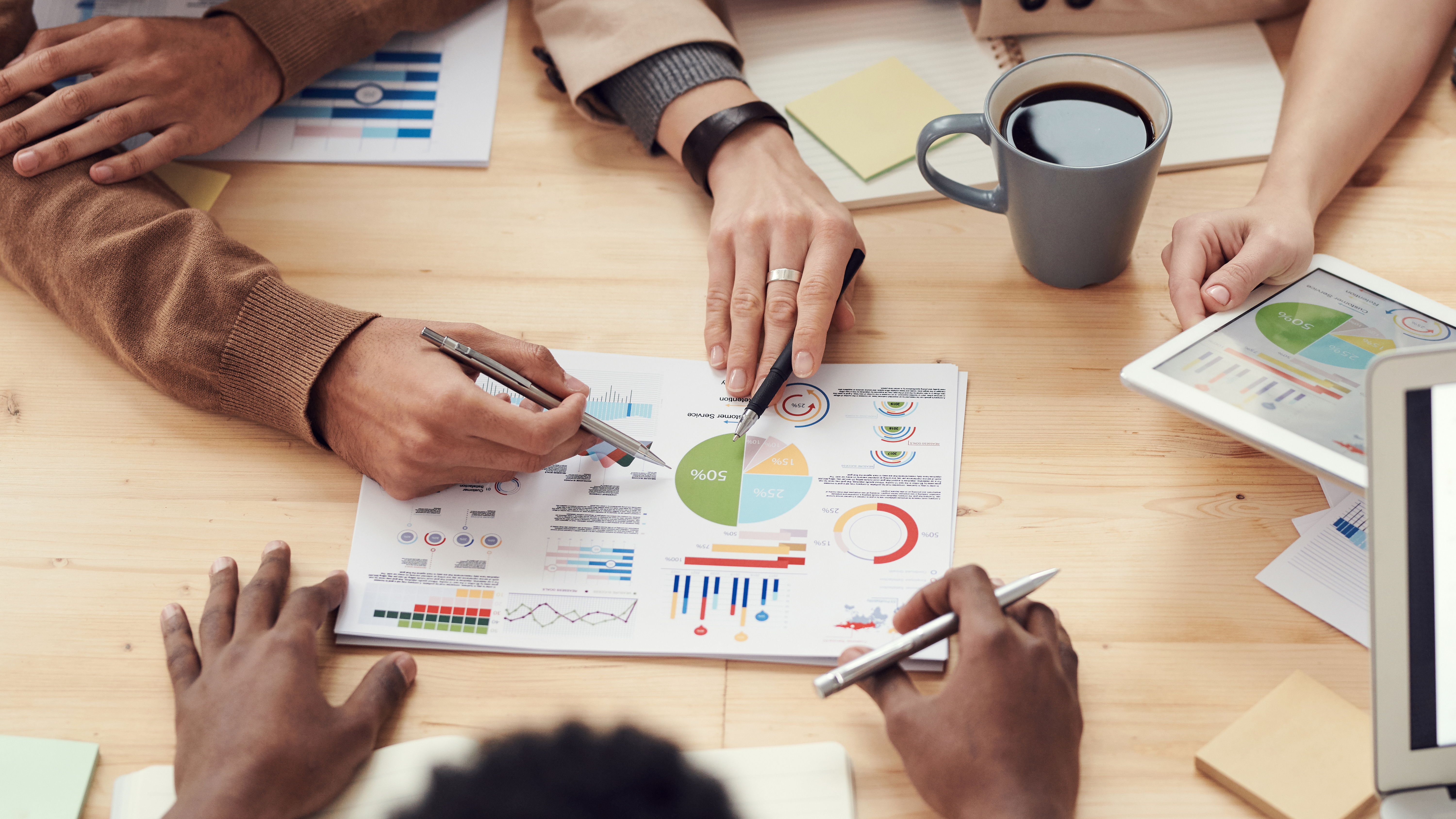 people-discuss-about-graphs-and-rates-3184292 (1) Image - Meeting